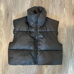 black puffy vest (m)
